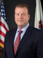 Commissioner Erik B Smith
